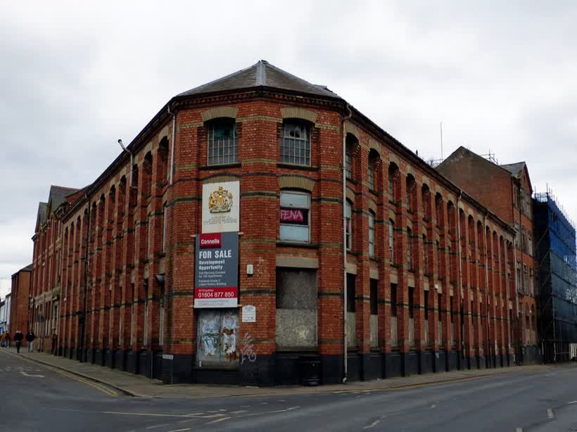 Former G T Hawkins Factory, (<a href="https://britishlistedbuildings.co.uk/101390677-former-g-t-hawkins-factory-part-originally-hornby-and-west-northampton</a>Grade II</a>). Originally a boot and shoe factory, vacant at the time of this photograph. See the listed entry for more history.GOC East Midlands' walk on 18 February 2018. This was a 4.8-mile circular walk entirely within the town of Northampton in Northamptonshire. Fred F led the walk, which was attended by 12 people. You can view my <a href=" rel="noreferrer nofollow">other photos of this event</a>, find out more about the <a href="www.goc.org.uk" rel="noreferrer nofollow">Gay Outdoor Club</a> or see <a href="https://www.flickr.com/photos/anemoneprojectors/collections/">my collections</a>., close to the Aldi on Earl Street, Northampton