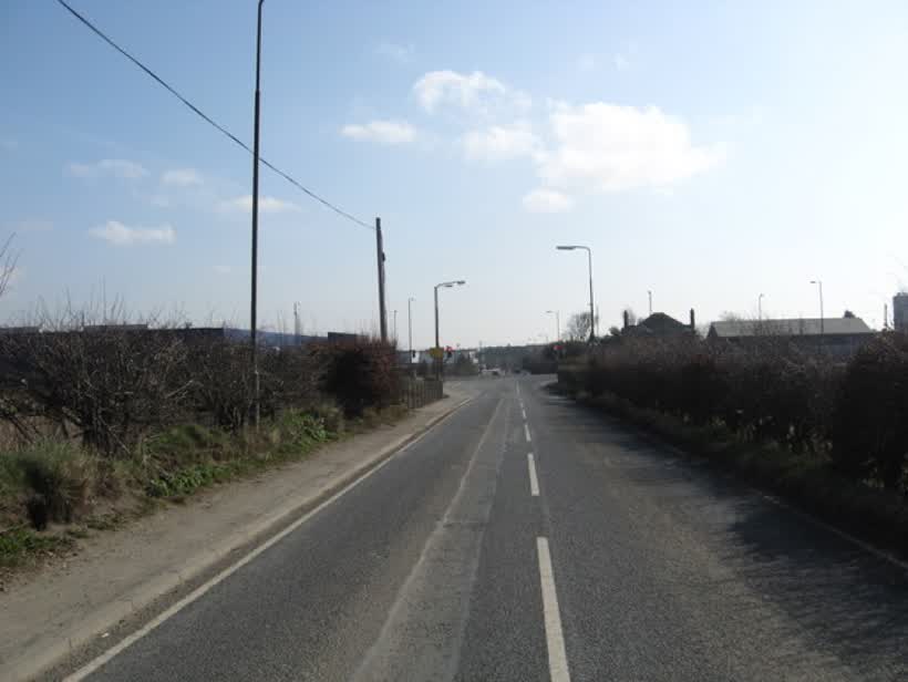 The minor road from Old Pentland nearing its junction with the A701, close to the Aldi on Pentland Road, Loanhead