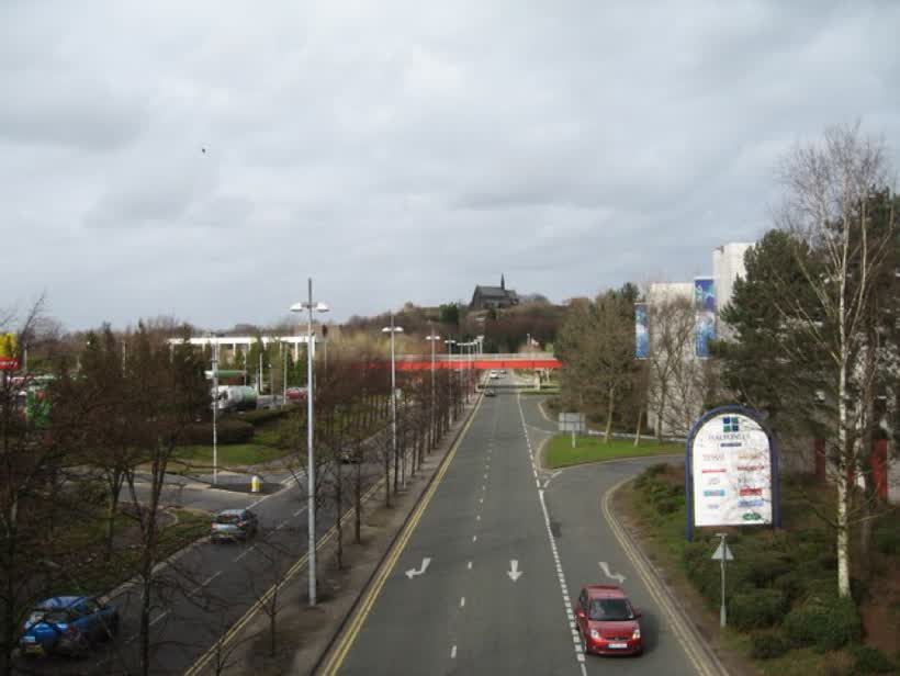 Access Road, Halton Lea Access road to the shopping city. The church of St Mary, Halton, can be seen in the distance, close to the Aldi on Trident Retail Park, Runcorn
