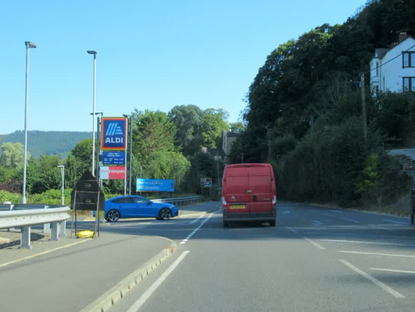 The A5 passing the Llangollen Aldi store, close to the Aldi on Berwyn Street, Llangollen