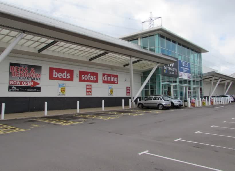 This way to the new beds &amp; bedroom department, FW Homestores, Newport, close to the Aldi on NP20 2NW, Newport